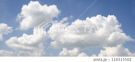 White fluffy clouds in deep blue sky 118315502