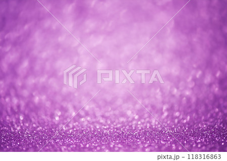 Abstract purple glitter background thin focus part and defocus lights. Sequins are purple. Abstract purple glitter background thin focus part and defocus lights. Sequins are purple. 118316863