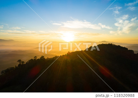 Amazing Sunrise or sunset over mountains hills covered with mist, Aerial view landscape drone shot beautiful colorful nature background 118320988