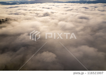 Amazing Sunrise or sunset over mountains hills covered with mist, Aerial view landscape drone shot beautiful colorful nature background 118321007