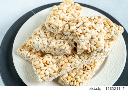 Sweet puffed rice. Food dessert crispy cracker with sugar Sweet puffed rice. Food dessert crispy cracker with sugar 118325145