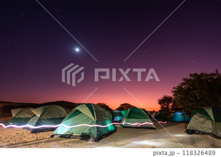 Full moon over a campsite 118326489