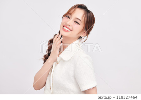 Beautiful young asian woman with clean fresh skin on white background, Face care, Facial treatment, Cosmetology, beauty and spa, Asian women portrait. Beautiful young asian woman with clean fresh skin on white background, Face care, Facial treatment, Cosmetology, beauty and spa, Asian women portrait. 118327464