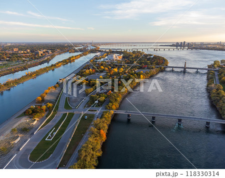 Aerial view of Notre Dame Island Circuit Gilles Villeneuve in autumn sunset time. Montreal, Quebec, Canada. Aerial view of Notre Dame Island Circuit Gilles Villeneuve in autumn sunset time. Montreal, Quebec, Canada. 118330314