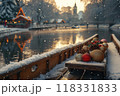 Snowy Winter Sunset in Mountain Village with Festive Decorations, Wooden Bench, and Calm Lake Reflections 118331833