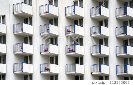 Monotonous boring empty balconies on a massive complex with small holiday apartments 118333062