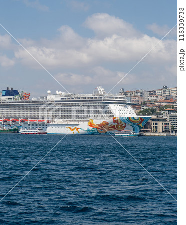 Anchored cruise ship off the coast of Istanbul, with the city's historic skyline visible. Perfect for travel, tourism, and maritime content 118339738