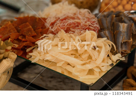 Gourmet Charcuterie Selection Featuring Assorted Deli Meats and Fish Delicacies 118343491
