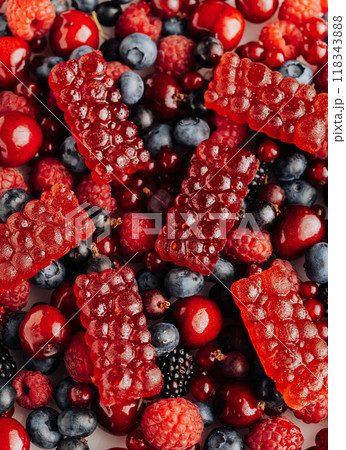 Natural fruit marmalade on fresh mixed berries, vibrant and colorful, food advertising and marketing 118343888