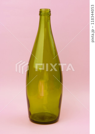 Colorful glass bottle, unusual background Colorful glass bottle, unusual background 118344053