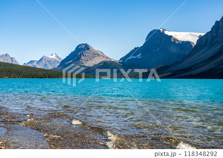 Bow Lake lakeshore in summer sunny day. Bow Glacier, Banff National Park, Canadian Rockies, Alberta, Canada. Bow Lake lakeshore in summer sunny day. Bow Glacier, Banff National Park, Canadian Rockies, Alberta, Canada. 118348292