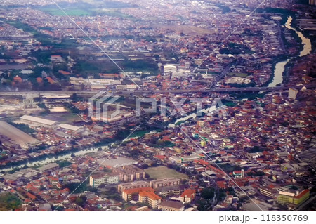 Aerial view of Surabaya, showcasing a sprawling urban landscape. 118350769