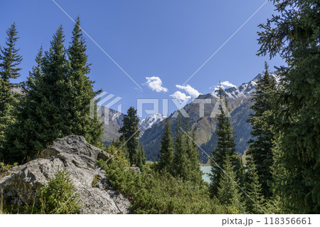 Beautiful mountain landscape, forest and mountains in summer time. Valley in Kazakhstan. Beautiful mountain landscape, forest and mountains in summer time. Valley in Kazakhstan. 118356661