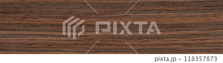 Cascading waves of caramel and coffee dance across the robust rosewood veneer's surface Cascading waves of caramel and coffee dance across the robust rosewood veneer's surface 118357873