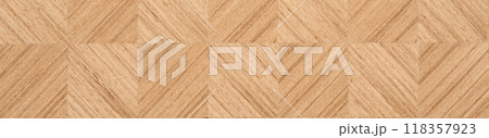 Symmetrical parquet veneer showcasing the artistry of wood patterns Symmetrical parquet veneer showcasing the artistry of wood patterns 118357923