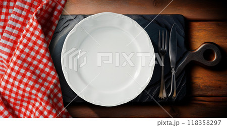 Empty Plate on Black Stone Cutting Board with Silver Cutlery and Checkered Tablecloth - Generative Ai 118358297