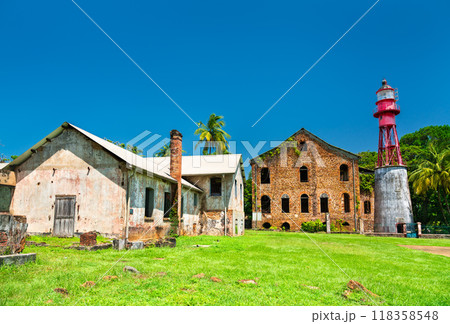 Lighthouse at a former penal colony at Ile Royale, the Salvation Islands in French Guiana, South America Lighthouse at a former penal colony at Ile Royale, the Salvation Islands in French Guiana, South America 118358548