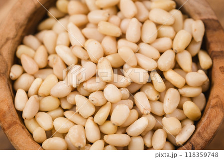 pine nuts in wood bowl pine nuts in wood bowl 118359748