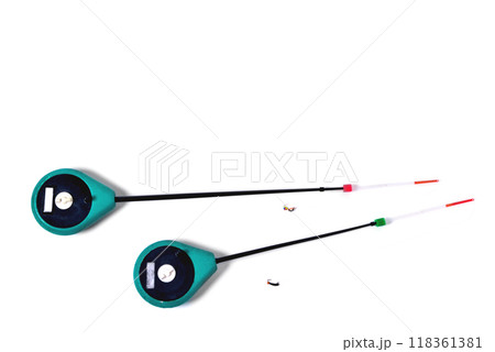 Fitted fishing rods for winter fishing on a white background, close-up 118361381