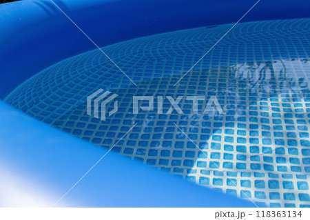 Blue inflatable pool 118363134