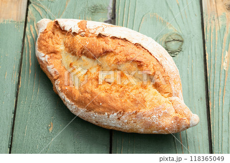 Loaf of wheat hearth bread . Top view Loaf of wheat hearth bread . Top view 118365049
