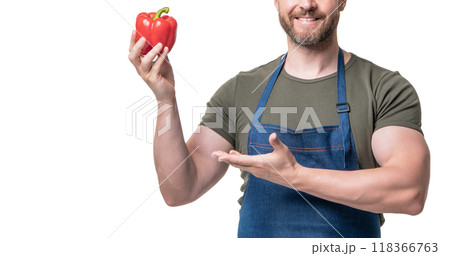 cropped view of man in apron presenting sweet pepper vegetable isolated on white cropped view of man in apron presenting sweet pepper vegetable isolated on white 118366763