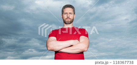 Grizzled man sky background. Serious man grizzle keeping arms crossed. Confident man in casual 118367738