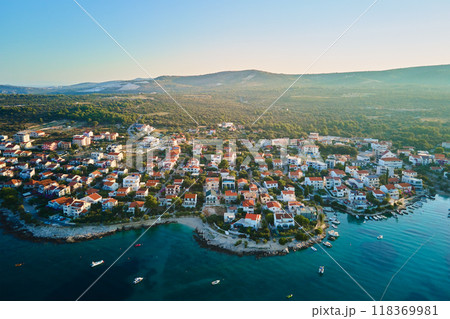 Aerial view of Adriatic sea coastline with coastal village and boats along shoreline. Panorama of tourist town Rogoznica in Croatia on Adriatic Sea. Summer travel concept 118369981