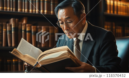 Seasoned Asian Lawyer in a Classic Library Setting 118370432