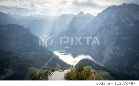 Mountain summit lookout with high rocky peaks and walls surrounding lake on its bottom, Germany 118370497