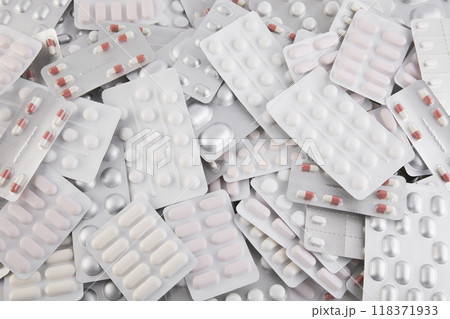 Big heap of many various pills and tablets packs and blisters Big heap of many various pills and tablets packs and blisters 118371933