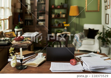 Cozy Home Office Space with Desk and Bookshelves 118373529