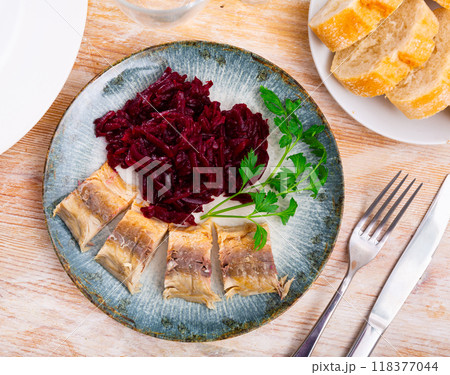 Smoked mackerel served with grated beetroot 118377044
