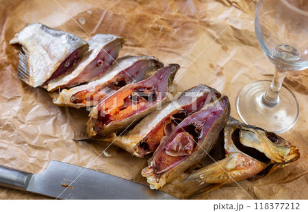 Aromatic dried-cured bream served for snack 118377212