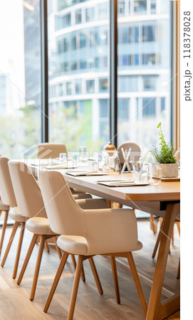 A large wooden table with a view of a city skyline A large wooden table with a view of a city skyline 118378028
