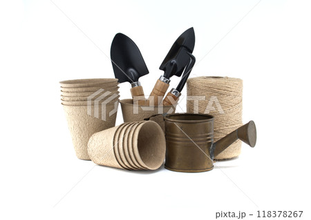 Gardening tools with organic pots, trowels, and twine for eco-friendly cultivation Gardening tools with organic pots, trowels, and twine for eco-friendly cultivation 118378267