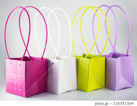 Plym package bags for flowers made of corrugated cardboard on white background Plym package bags for flowers made of corrugated cardboard on white background 118381304