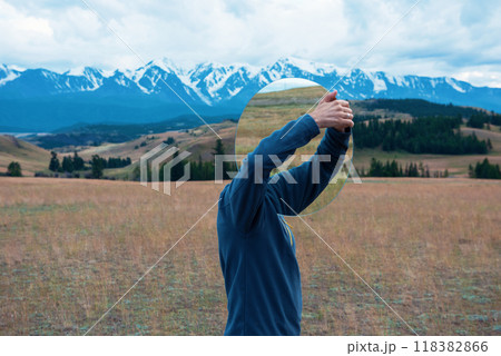 Man standing in in summer Altai mountains Man standing in in summer Altai mountains 118382866