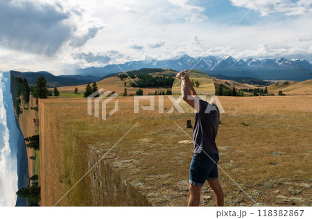 Man standing in in summer Altai mountains 118382867