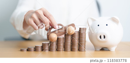 Money Saving, Car Insurance, Financial, vehicle Repair, Loan and Maintenance concepts. coins stack and piggy bank with Auto model, Money stack Counting arrangement for deposit and Automobile Tax Money Saving, Car Insurance, Financial, vehicle Repair, Loan and Maintenance concepts. coins stack and piggy bank with Auto model, Money stack Counting arrangement for deposit and Automobile Tax 118383778