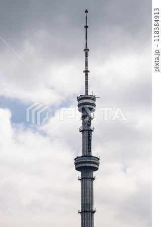 Koktobe Television and radio broadcast tower in Almaty, Kazakhstan. TV towers against the background of a cloudy sky. 118384913
