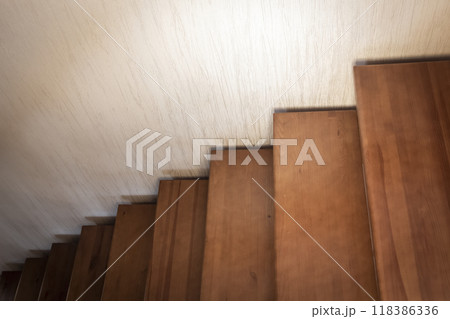Fragment of a wooden staircase Fragment of a wooden staircase 118386336