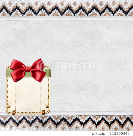 Horizontal Christmas background with knitted fabric texture and leather tag with bow. Wool sweater texture of brown and white color with geometric ornament and blank label. Copy space for text Horizontal Christmas background with knitted fabric texture and leather tag with bow. Wool sweater texture of brown and white color with geometric ornament and blank label. Copy space for text 118390443