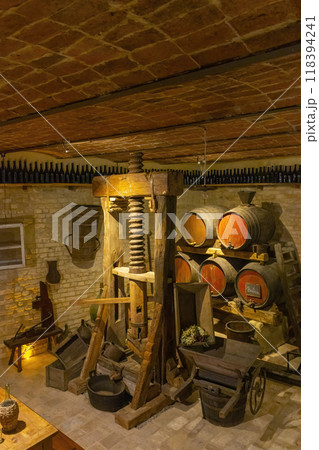 Traditional winemaking equipment in Castello di Razzano, Piedmont, Italy Traditional winemaking equipment in Castello di Razzano, Piedmont, Italy 118394241
