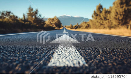 A long, asphalted road with upward arrows symbolizing growth, development, and the journey to success 118395704