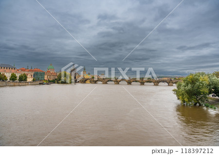 Flood in Prague. View of Charles Bridge over the flooding river Vltava, Prague 118397212