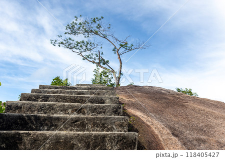 Stone stairs go up to the rock, Seychelles 118405427