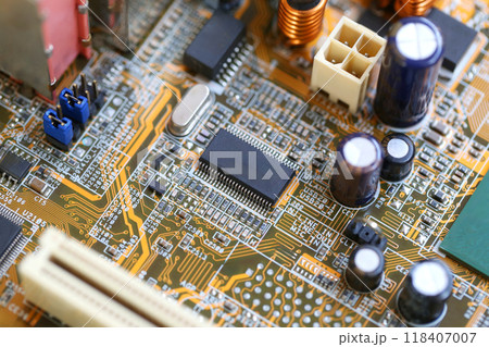 Black microchip socket on mainboard background. 118407007