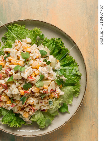 Canned corn salad, with crab sticks, top view, no people, Canned corn salad, with crab sticks, top view, no people, 118407767