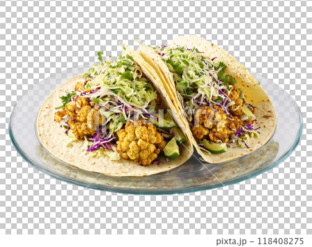 Roasted Cauliflower Tacos with chipotle sauce and slaw served on a transparent glass plate vegetarian Roasted Cauliflower Tacos with chipotle sauce and slaw served on a transparent glass plate vegetarian 118408275